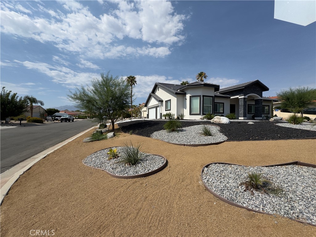 a front view of a house with entertaining space