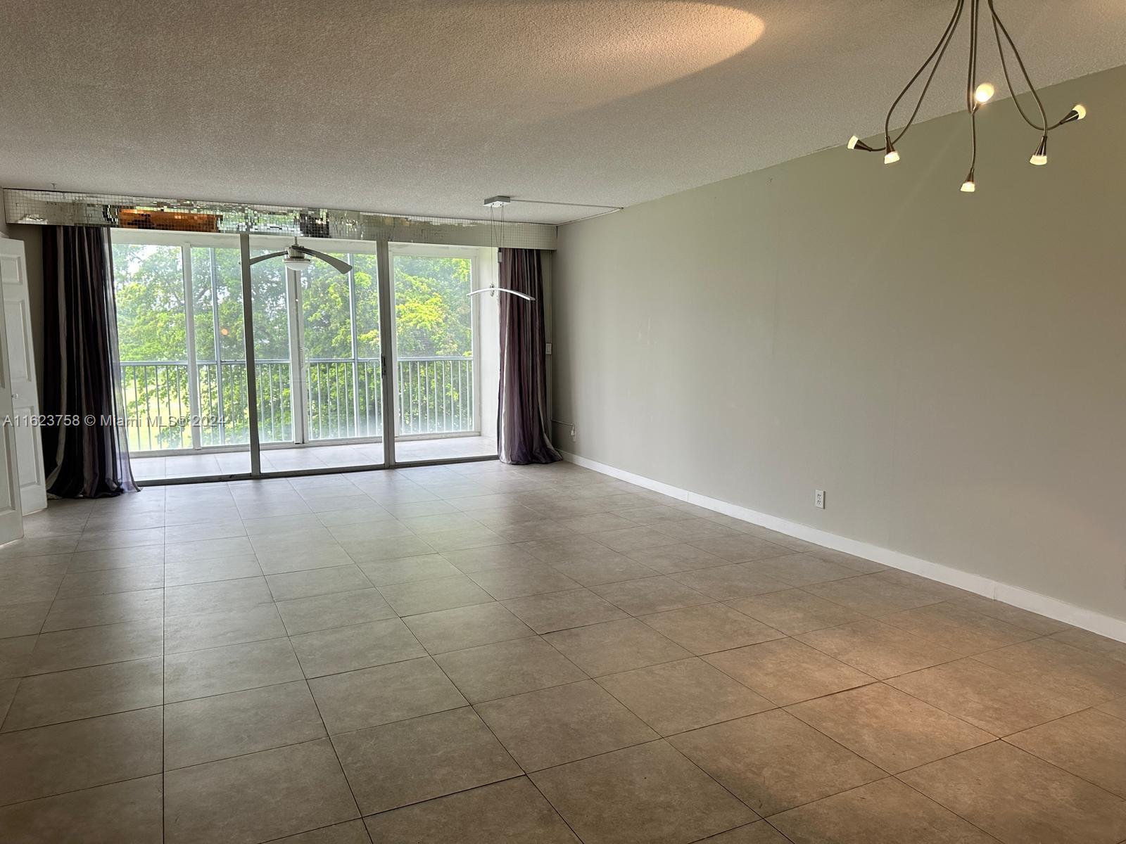 a view of a room with natural light