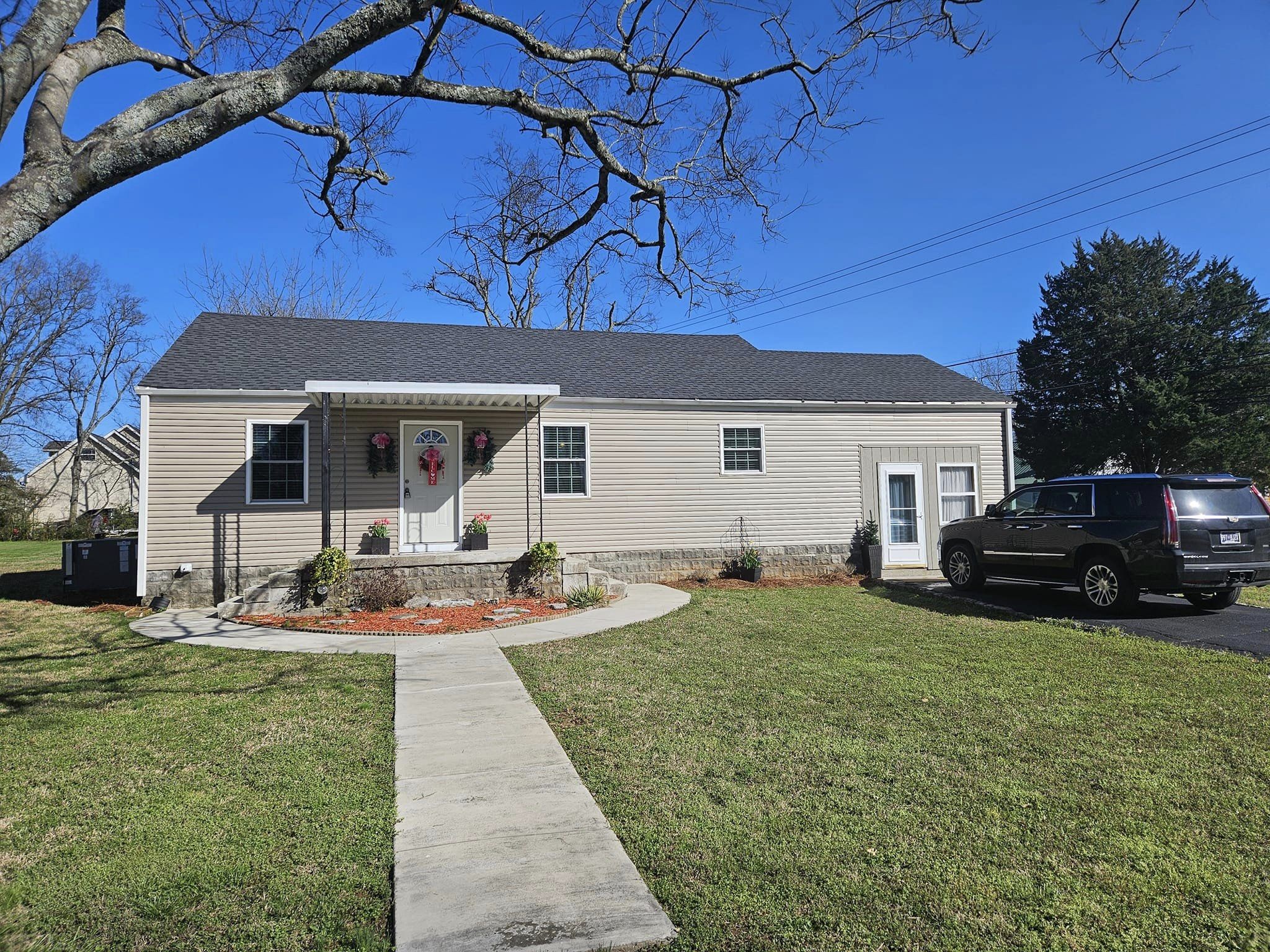 a front view of a house with garden