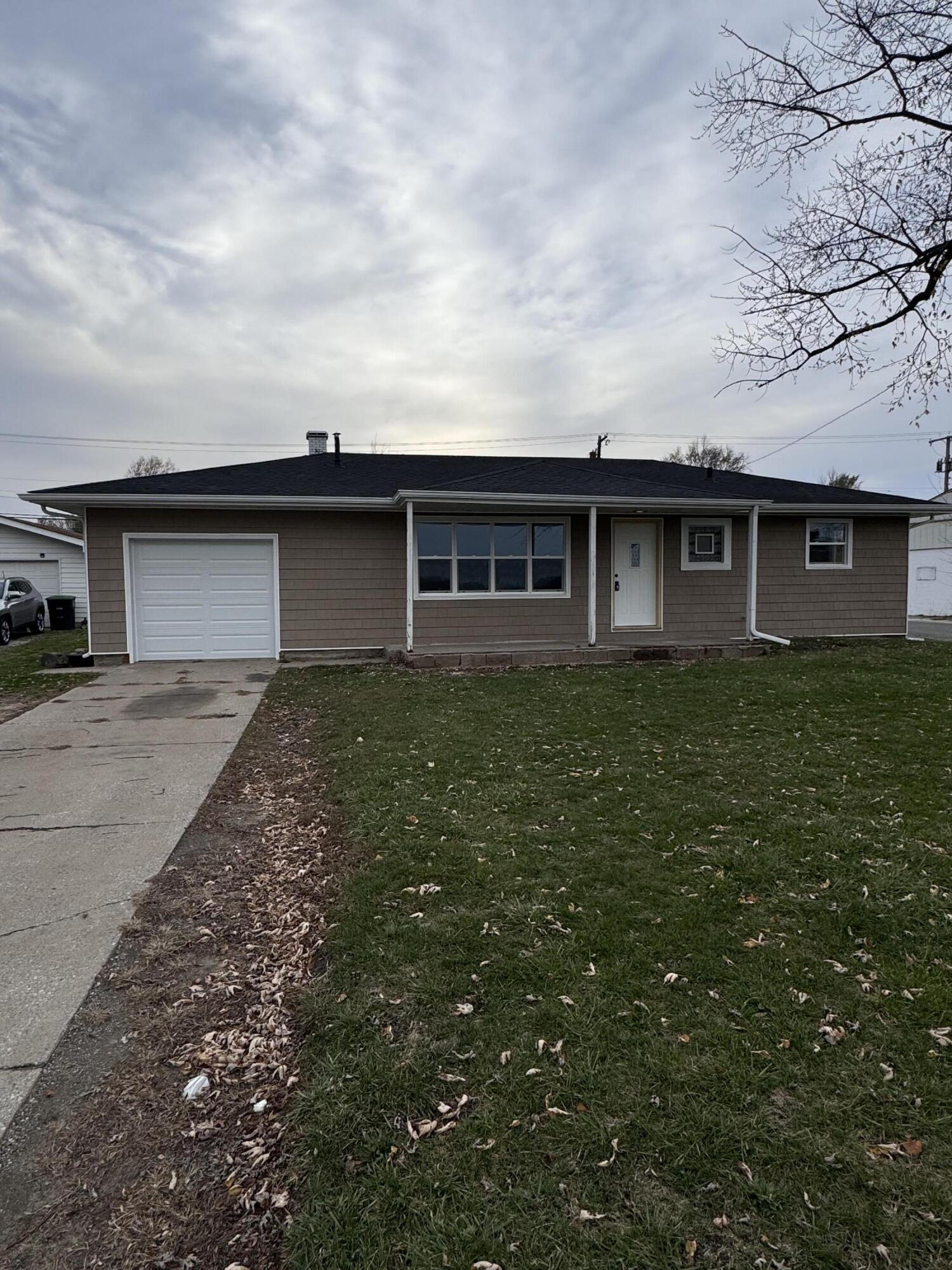 a front view of house with yard