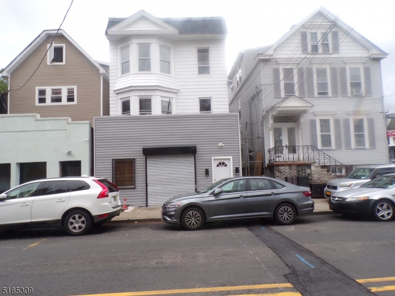 a car parked in front of a house