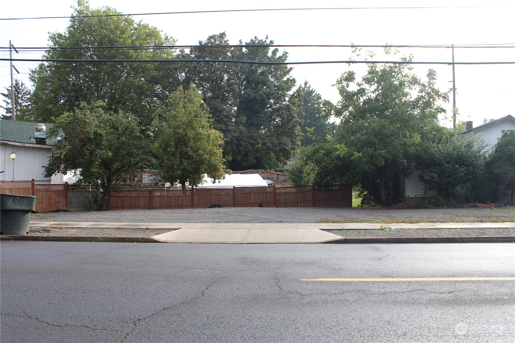 a view of street along with trees