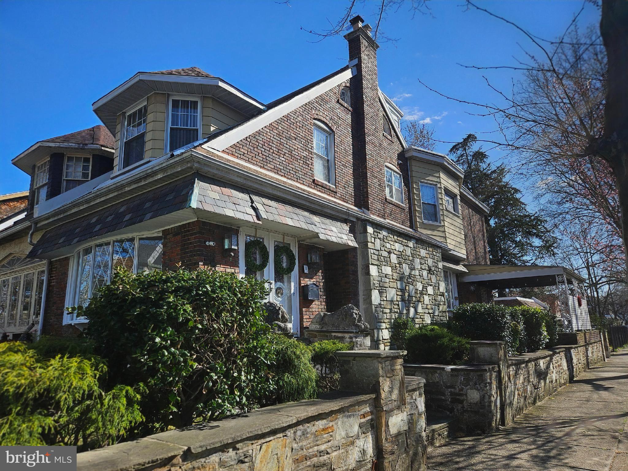 a front view of a house with yard