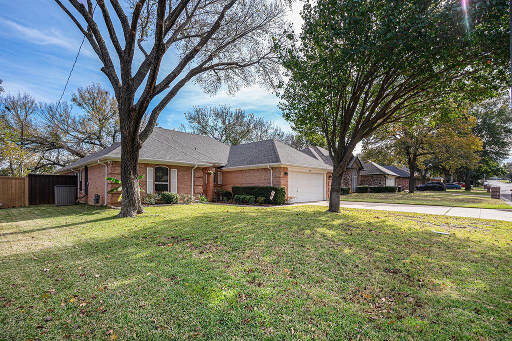 a house with trees in the background