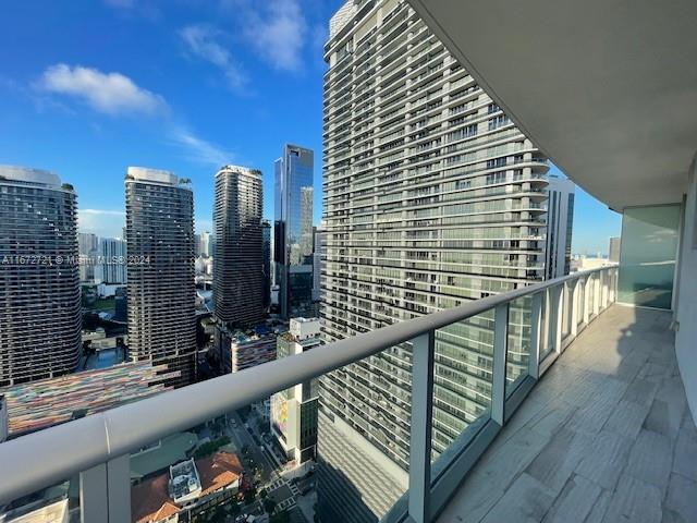 a view of balcony with city view