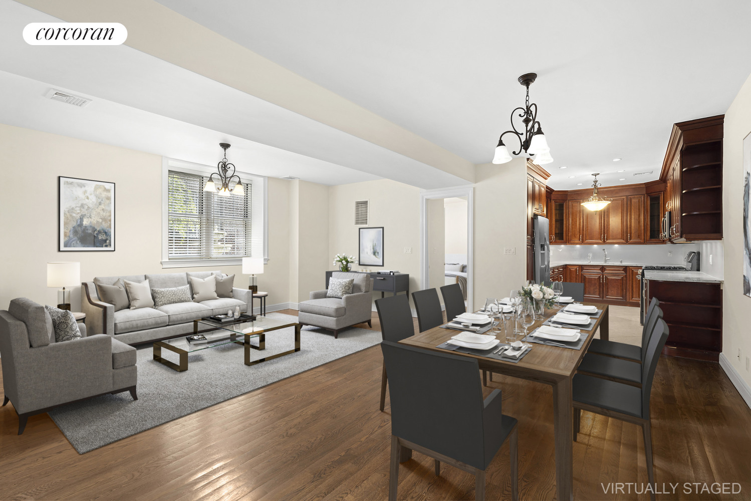 a living room with furniture kitchen view and a chandelier