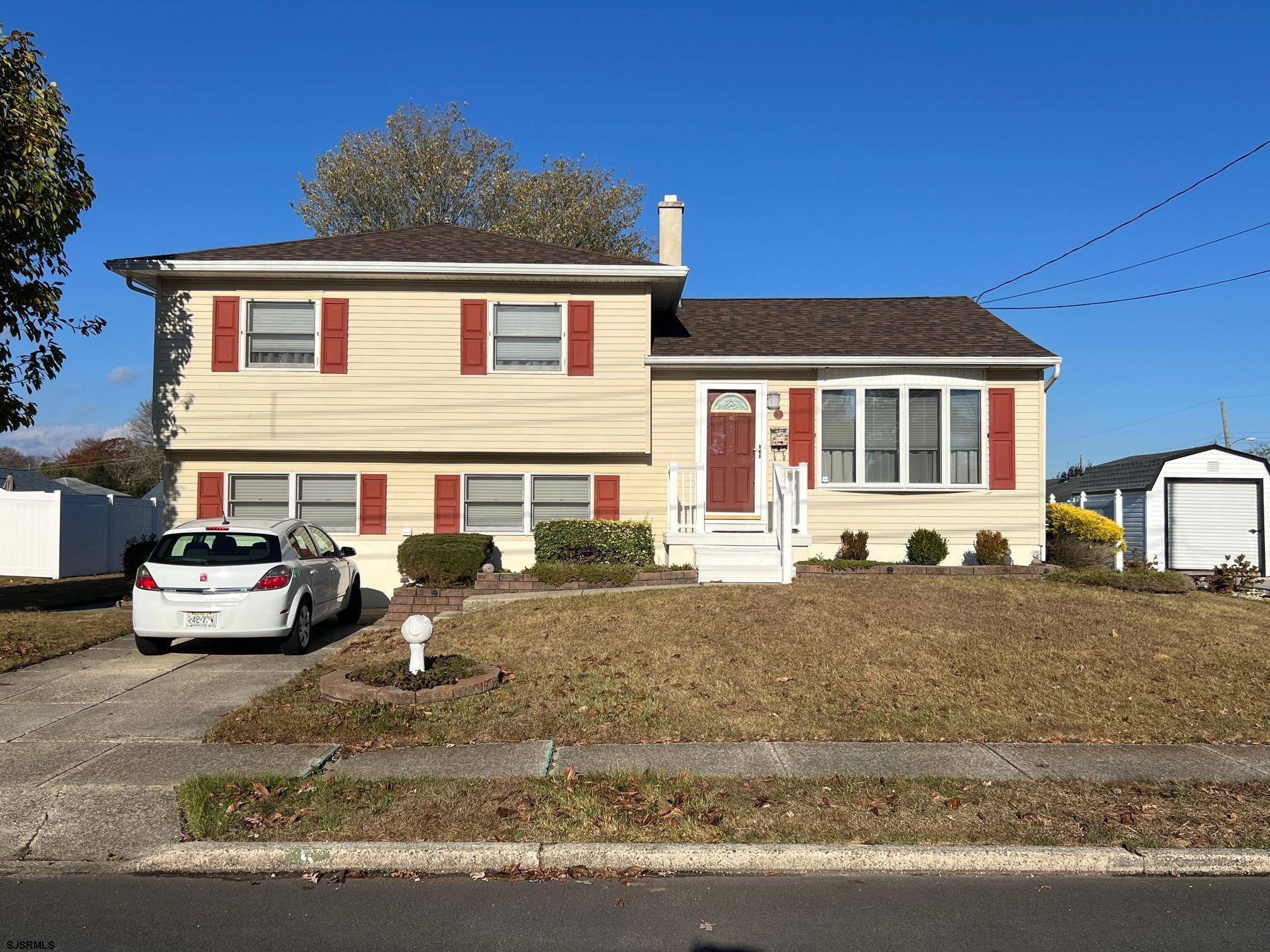 a front view of a house with patio