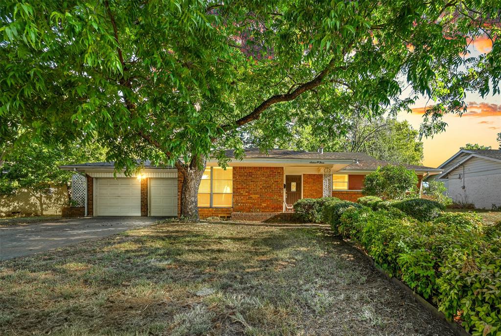 a house with trees in front of it