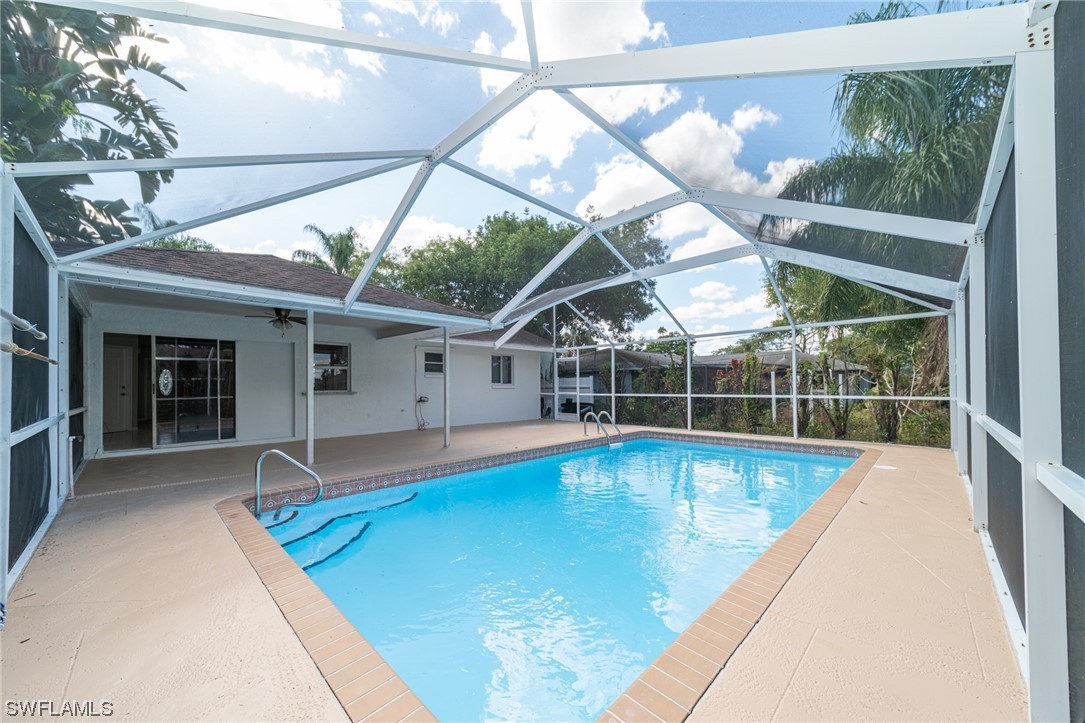 a view of a house with swimming pool