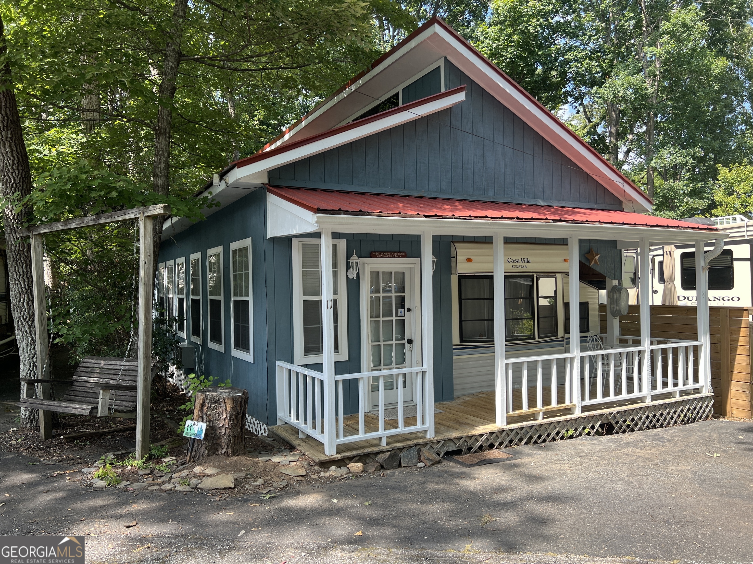 a front view of a house with a porch