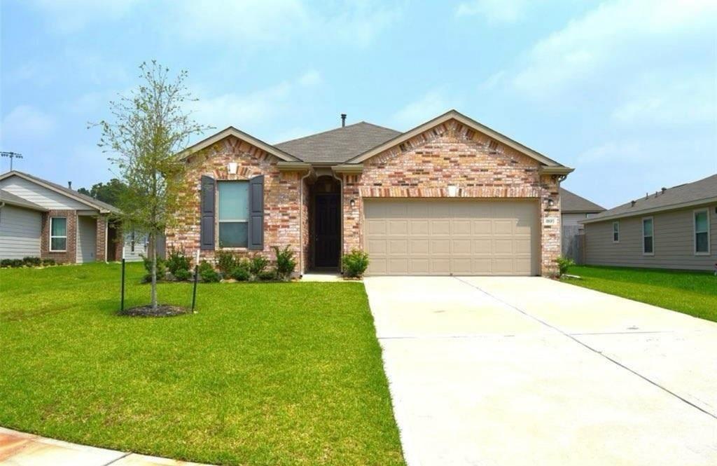 a view of outdoor space yard and front view of a house