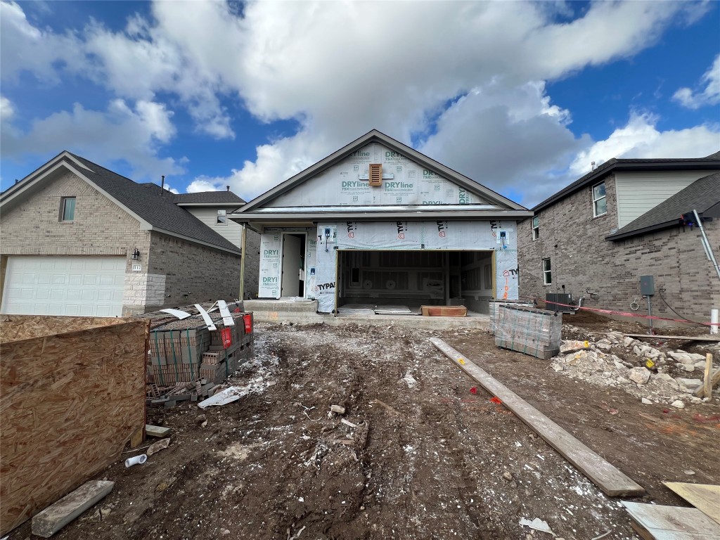 a front view of a house with yard