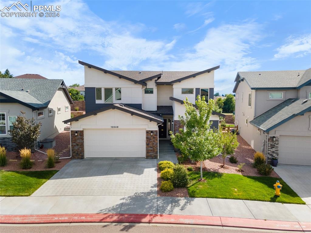 View of front of home featuring a garage