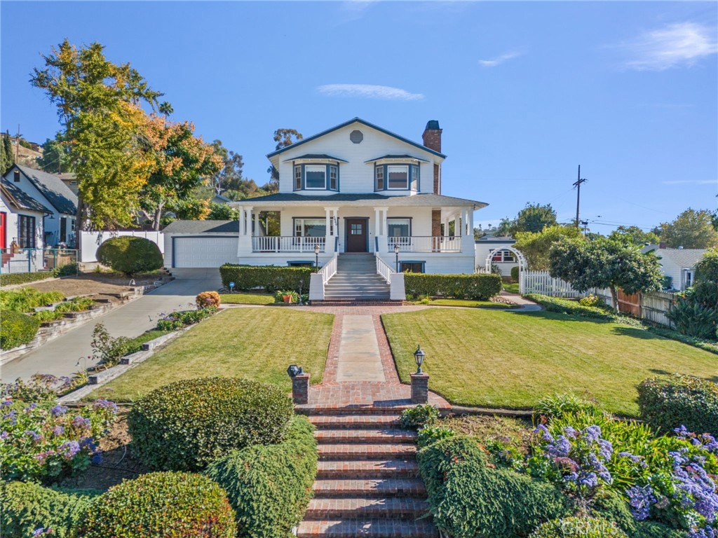 a front view of a house with swimming pool