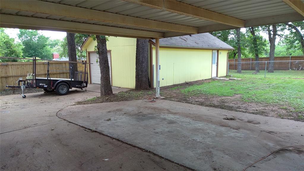 a view of backyard with green space