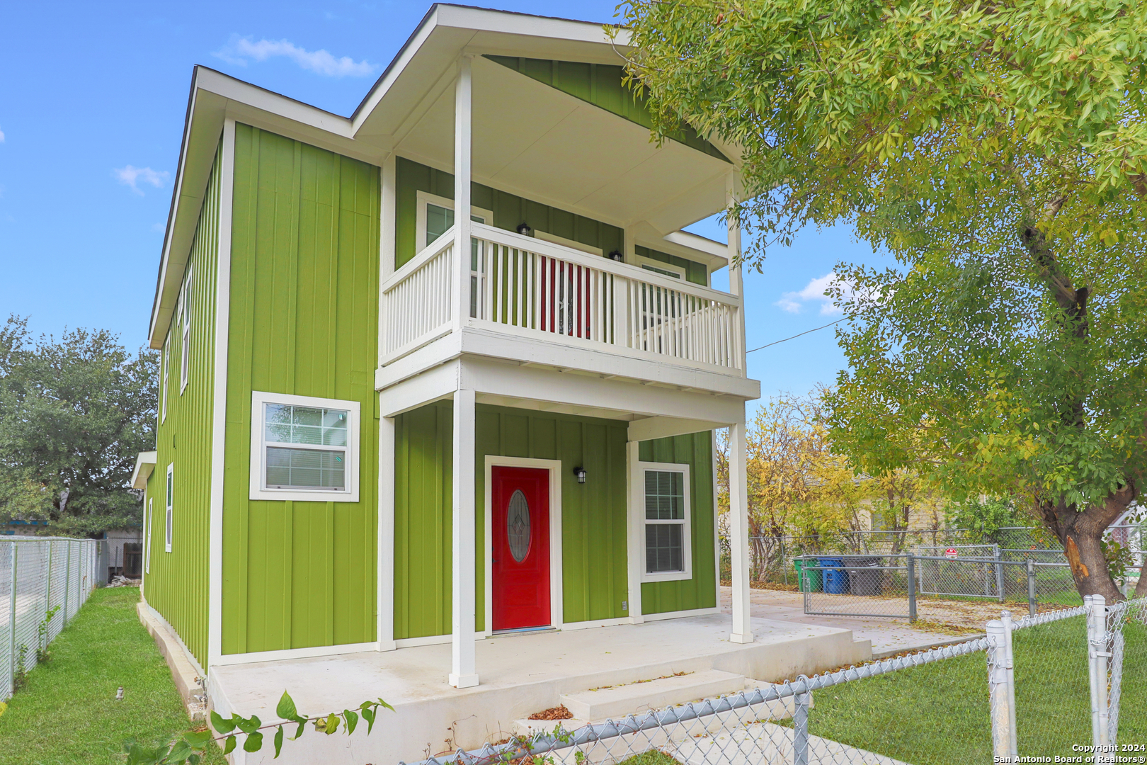 front view of a house with a small yard