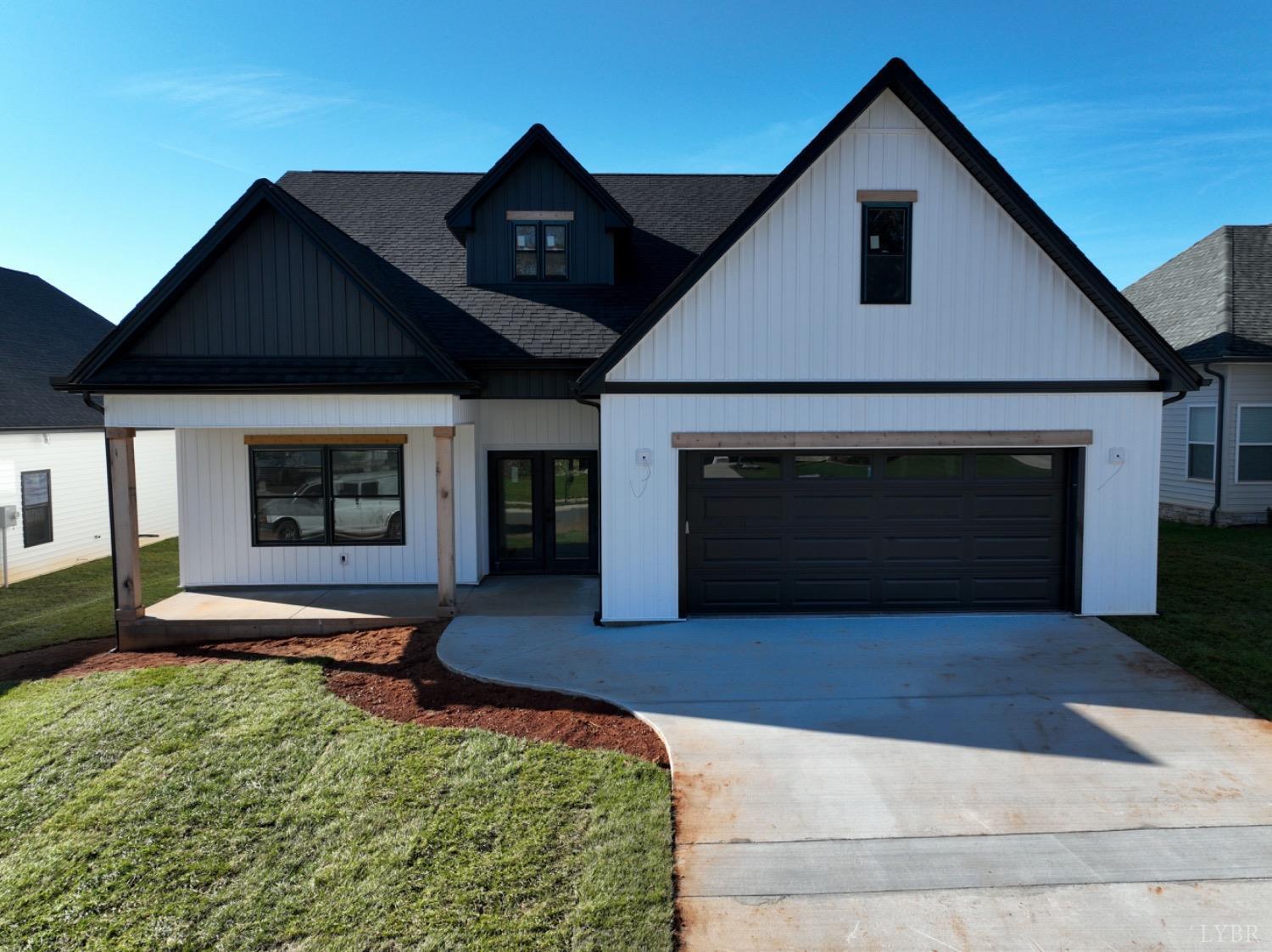 a front view of a house with yard