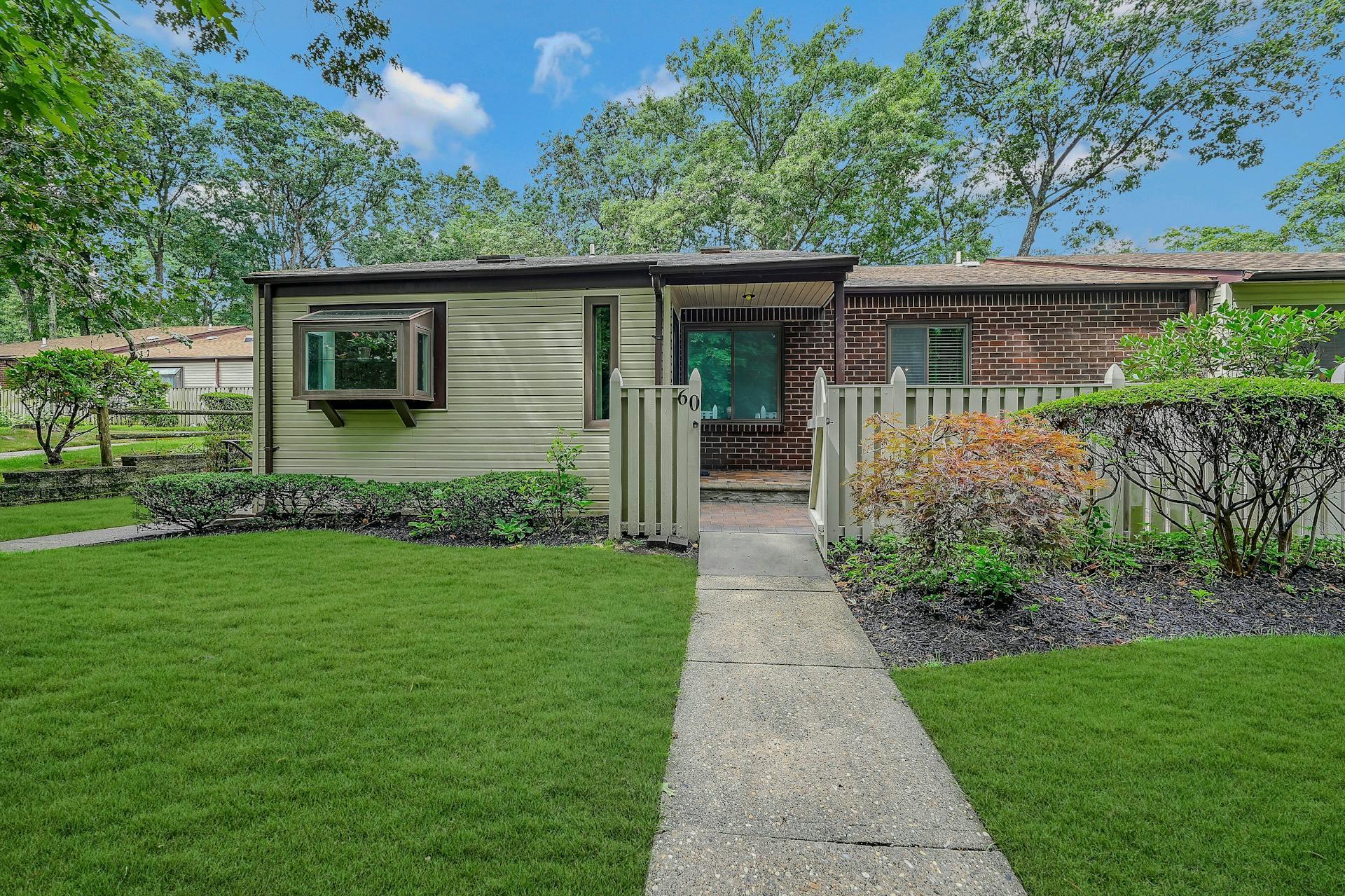 Ranch style unit with fenced in patio