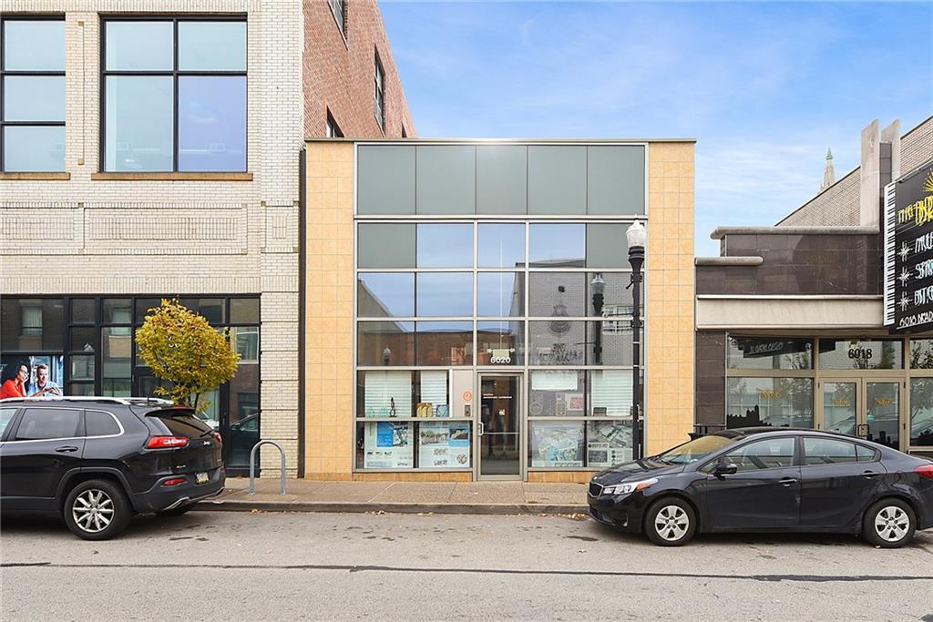 a car parked in front of a building