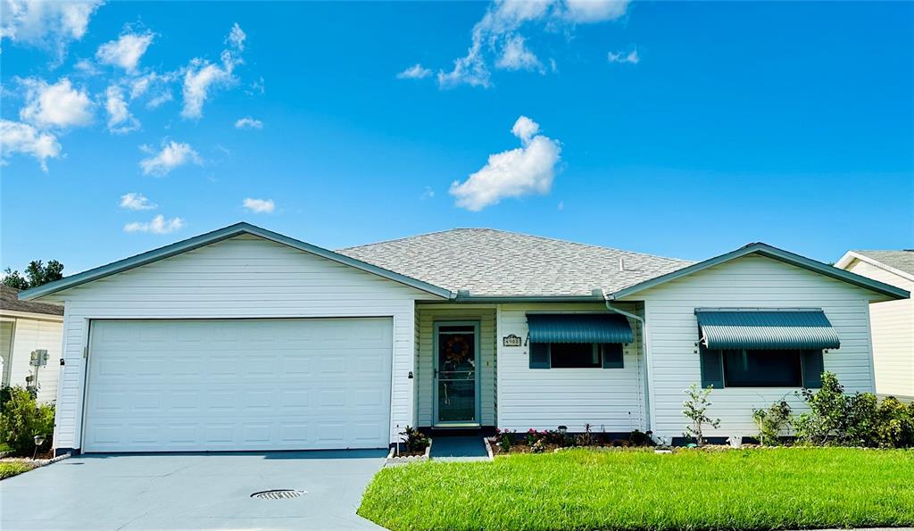 a front view of house with yard