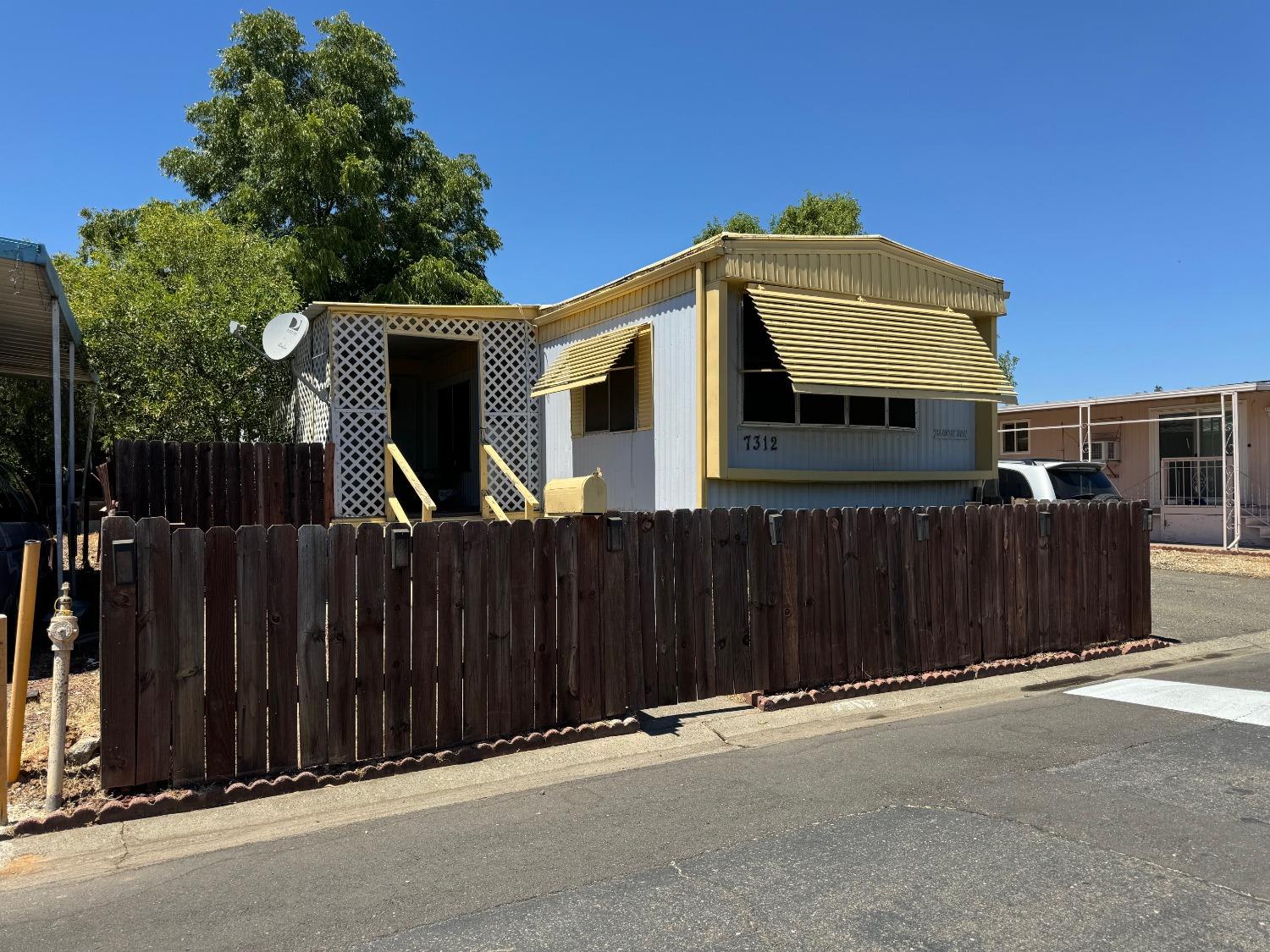 a front view of a house with a garage