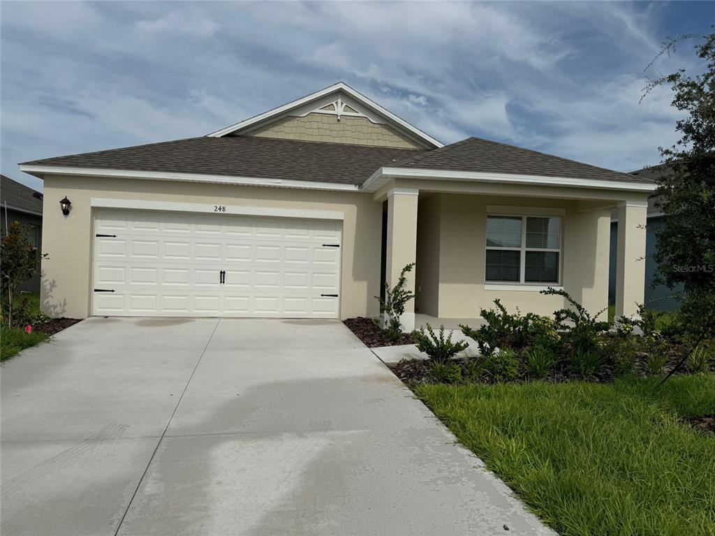 a front view of house with yard