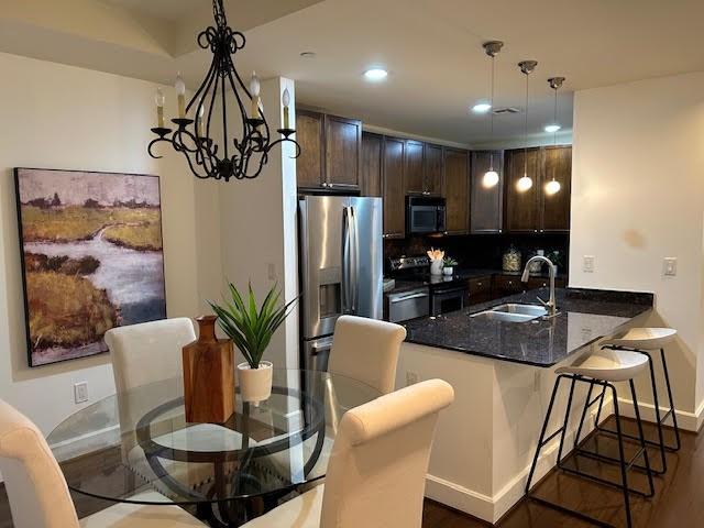 a view of a dining room with furniture