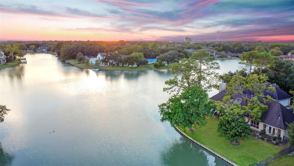 a view of a lake with a city