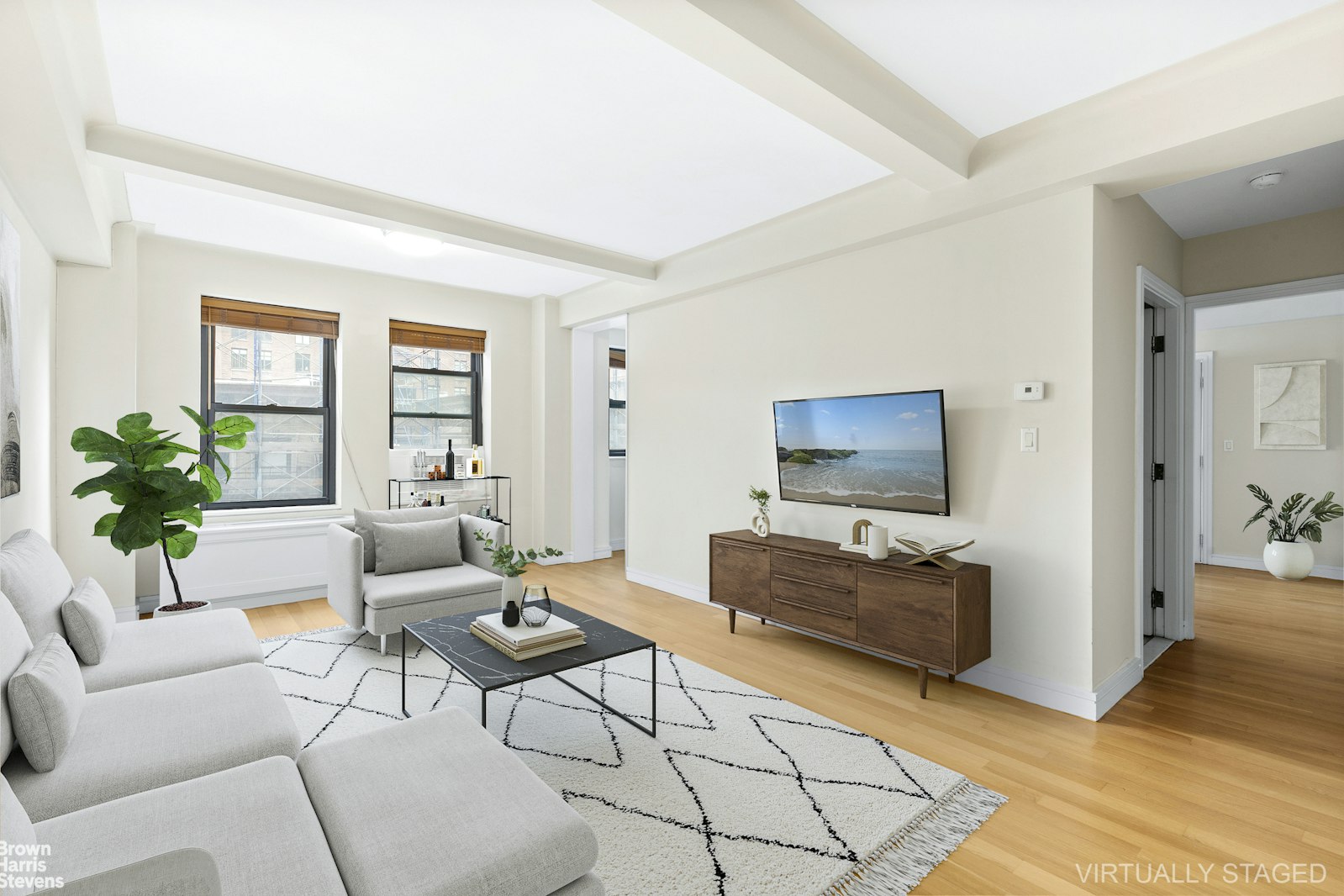 a living room with furniture and a window