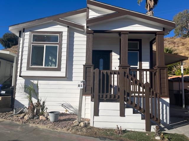 a front view of a house with street