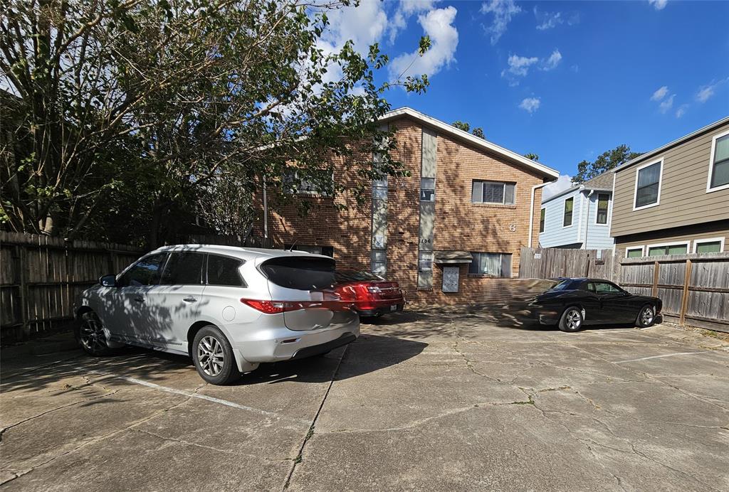 a car parked in front of a house