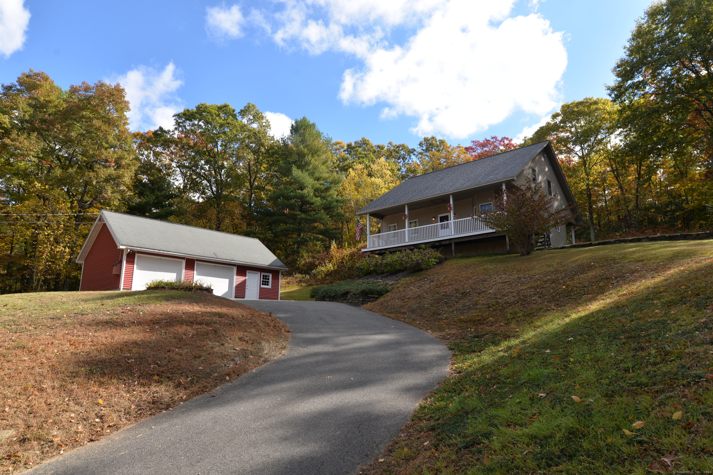 a view of a house with a yard