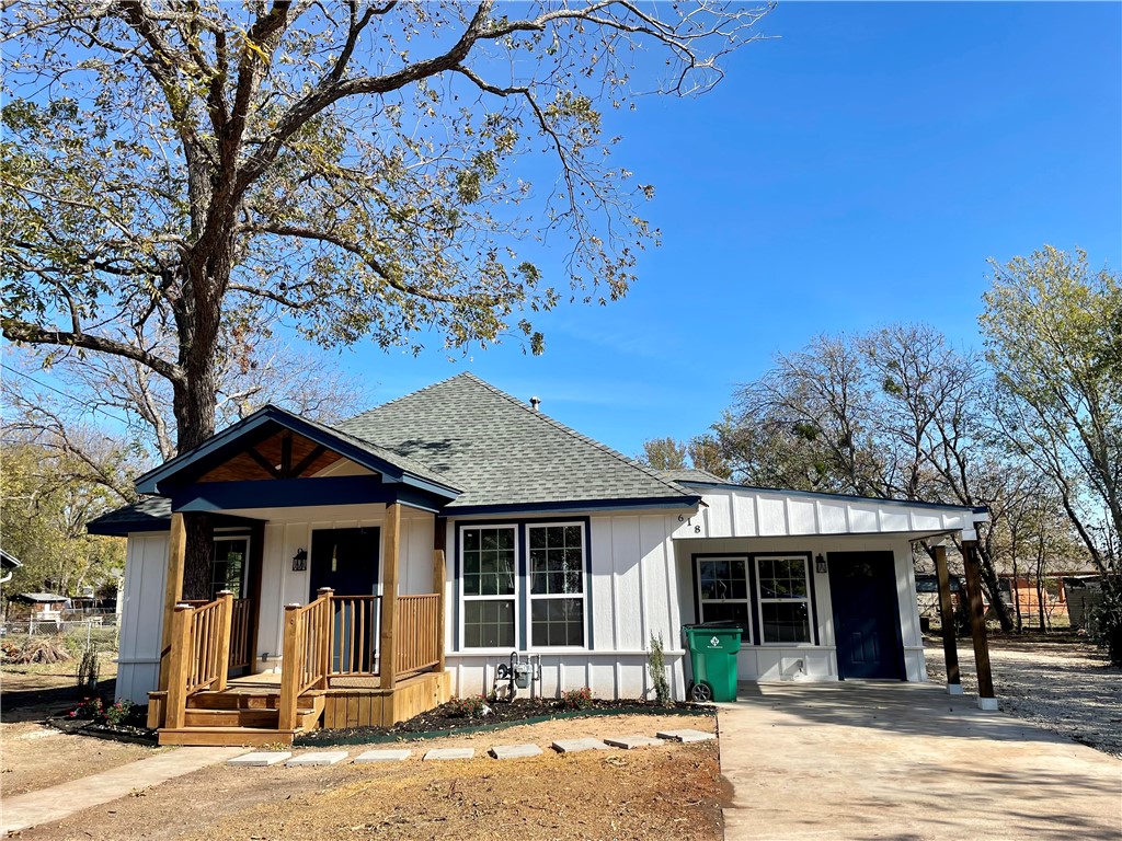 a front view of a house with a porch