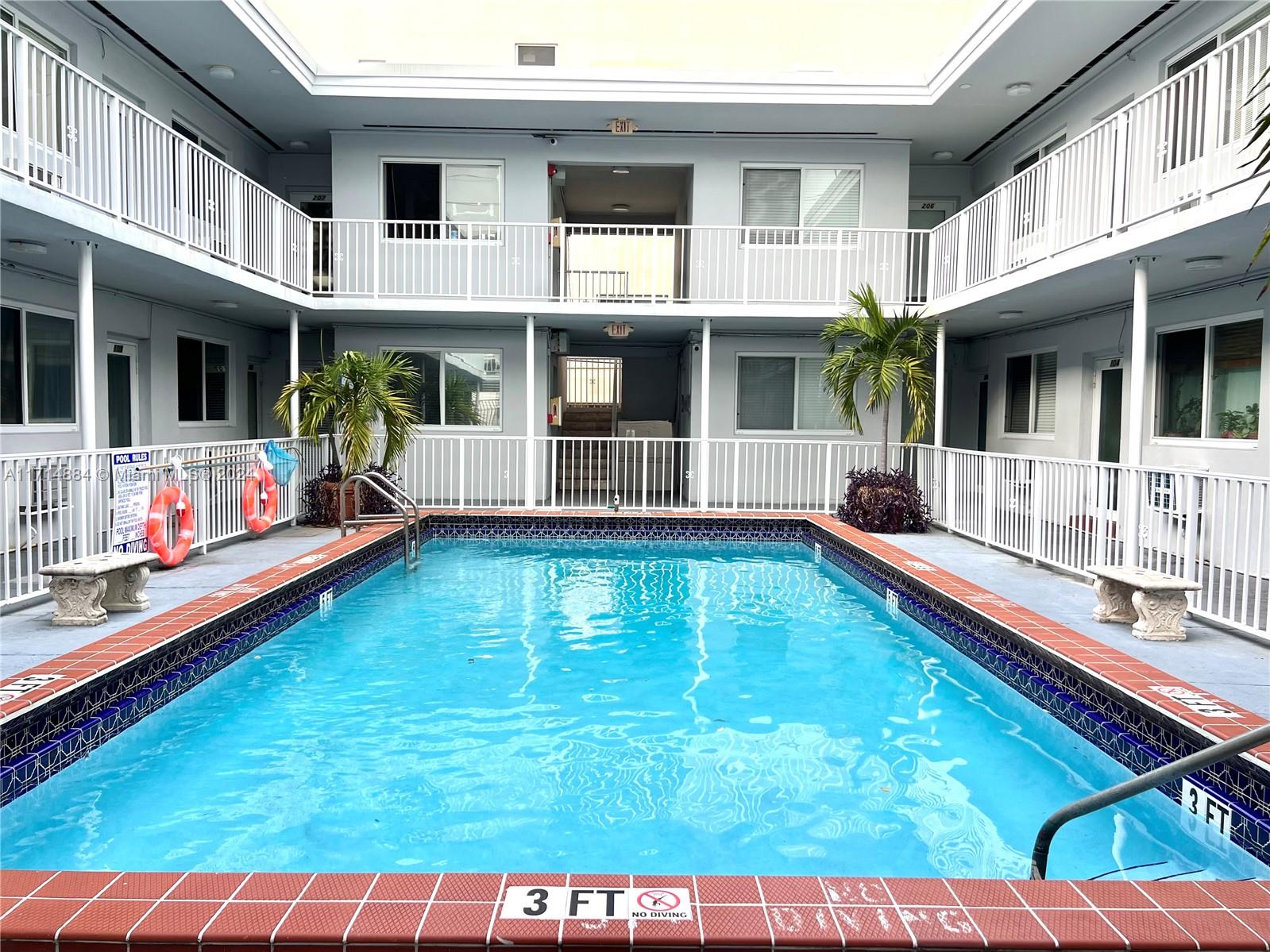 a view of an house with swimming pool