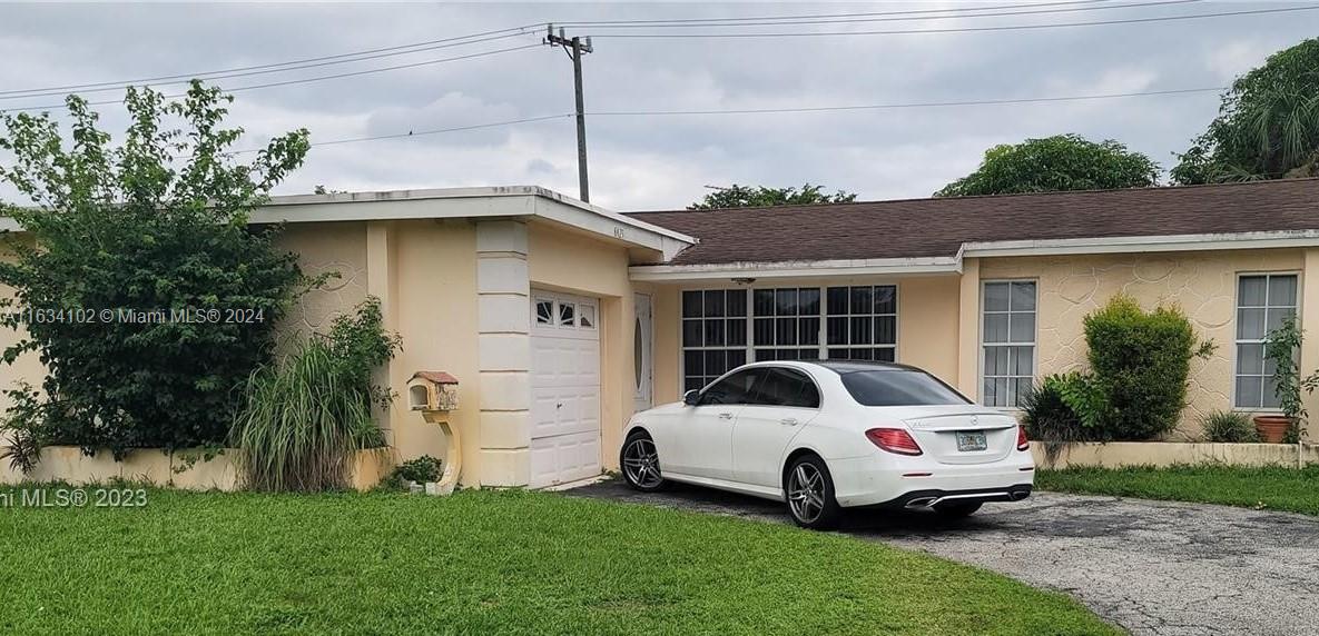 a car parked in front of a house