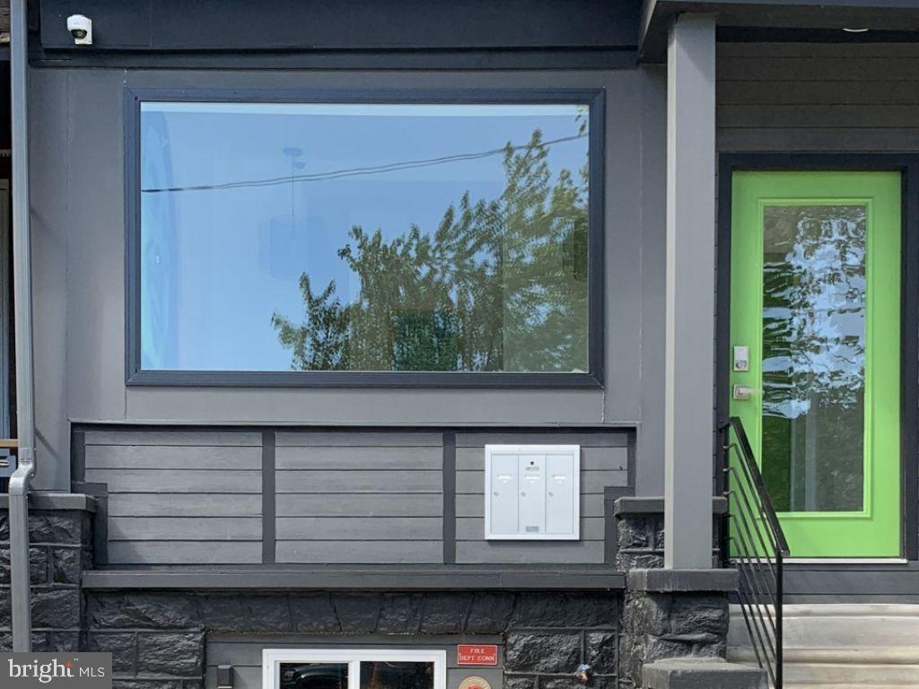 a window with a potted plant on it