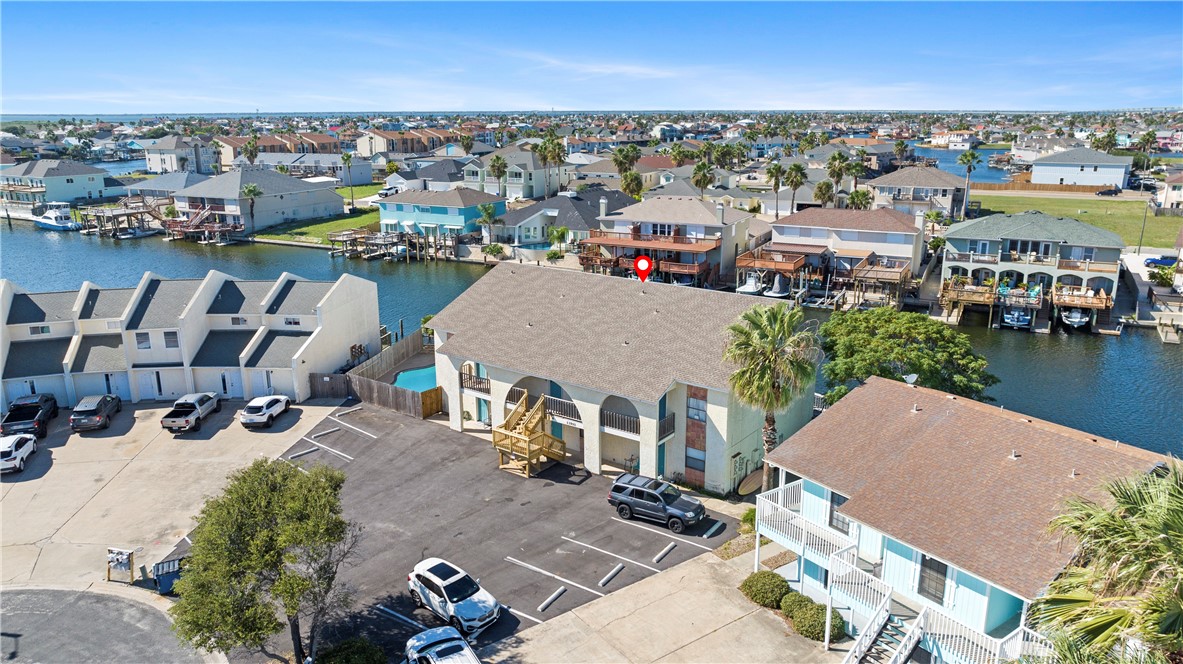 an aerial view of a house with outdoor space