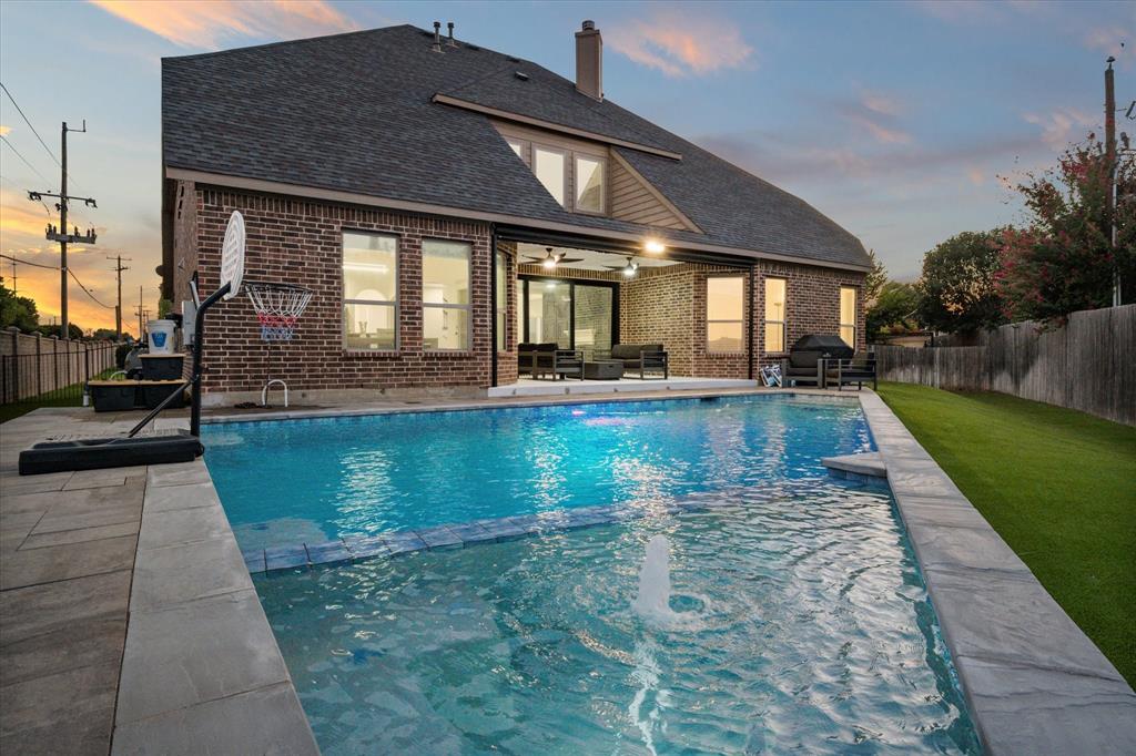 a view of a house with swimming pool