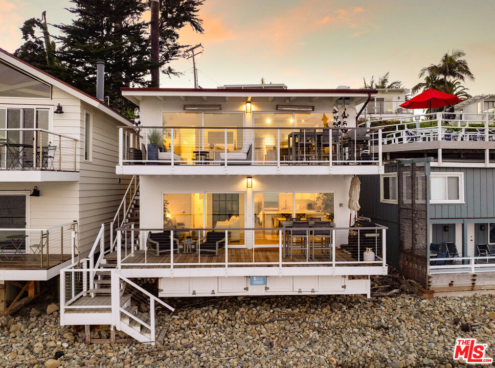 a view of a house with roof deck