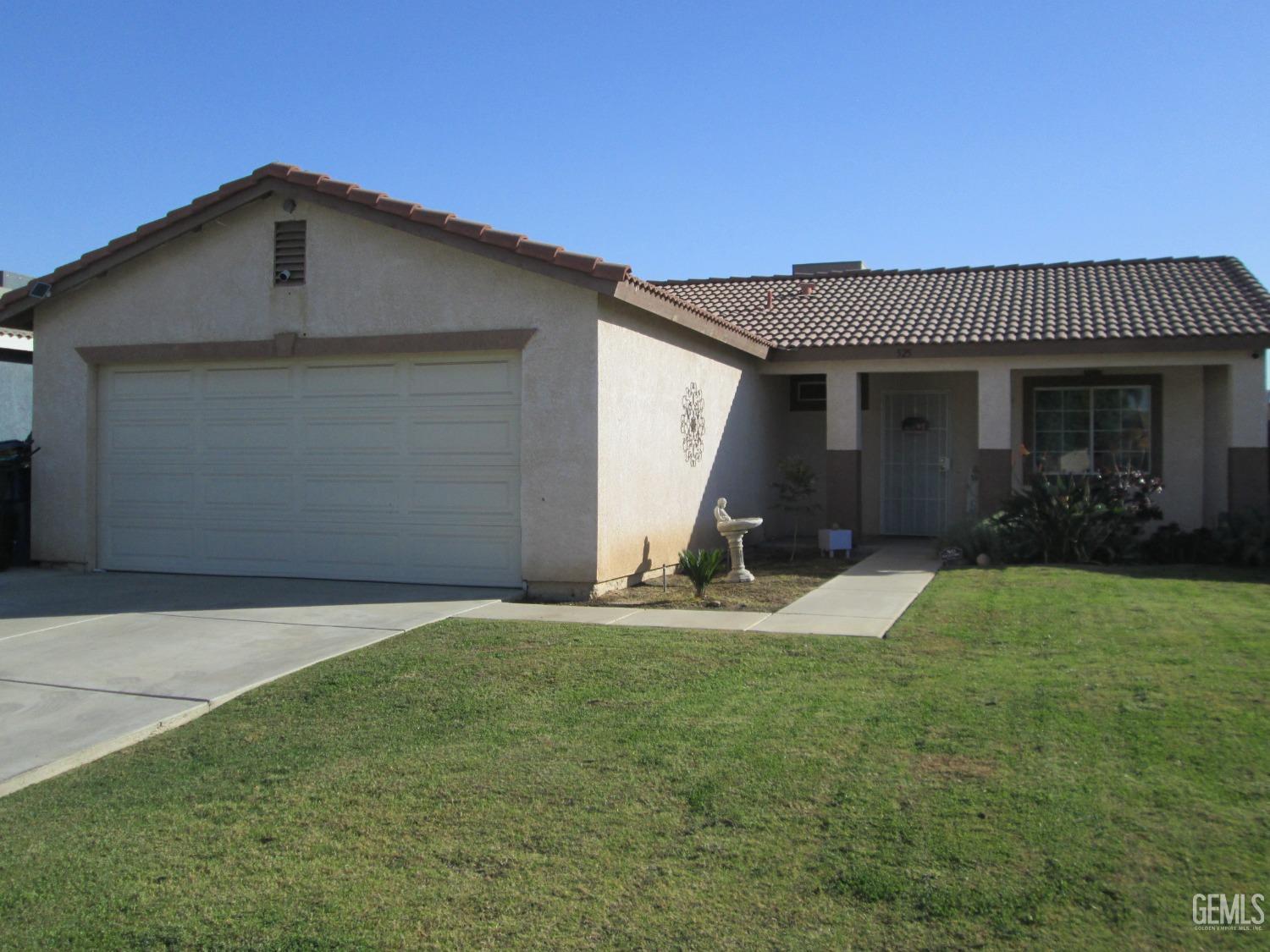 a view of outdoor space yard and garage