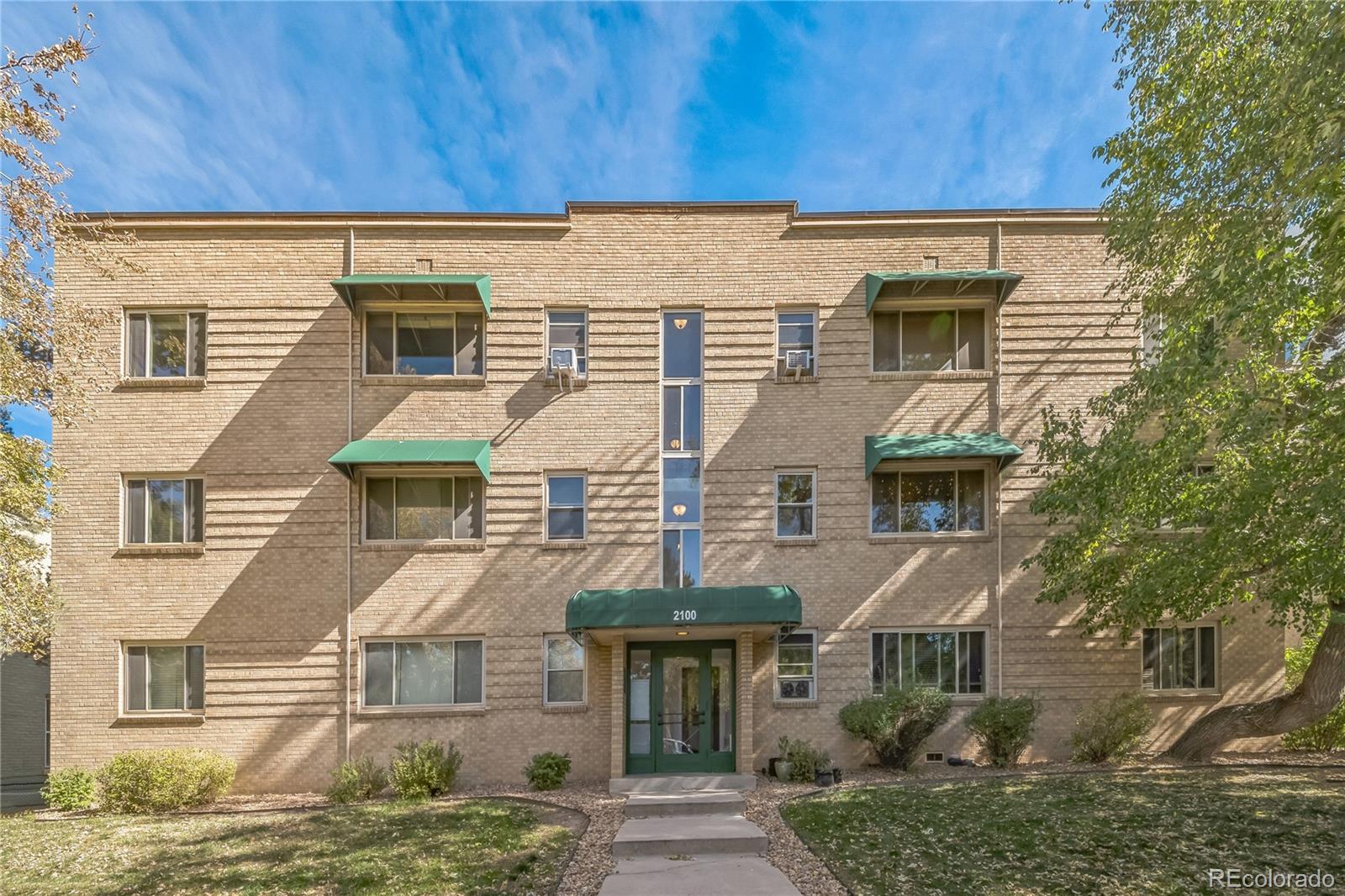 front view of a house with a balcony