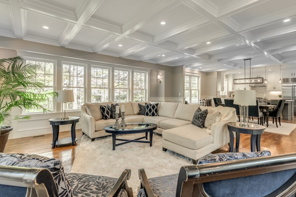 a living room with furniture and a table