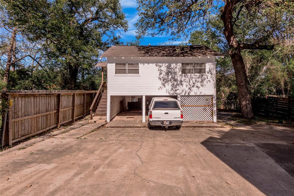 a view of a car park in front of house