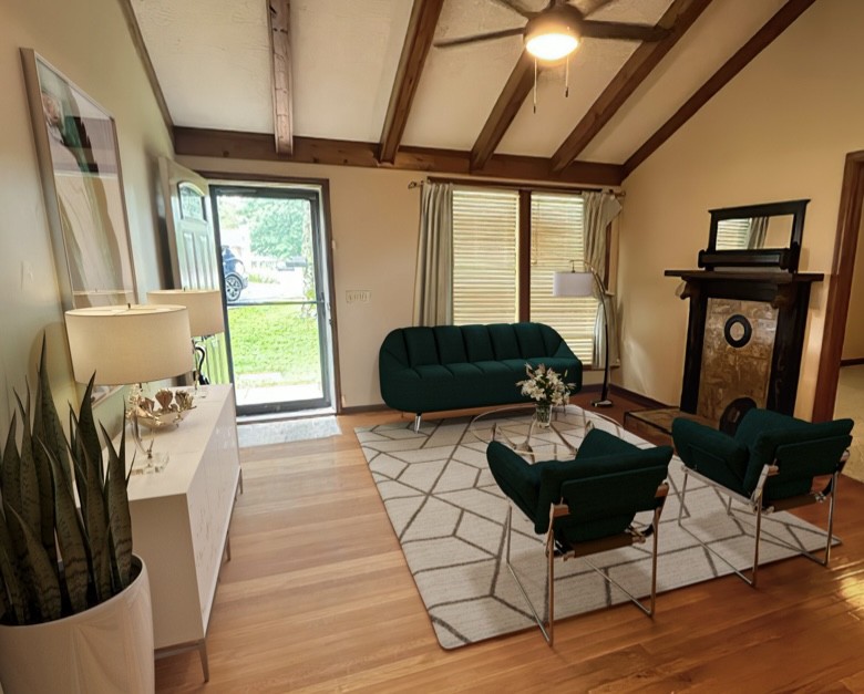 a living room with furniture and a large window