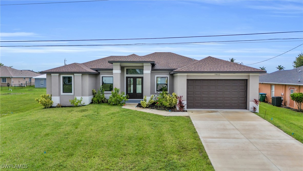 front view of a house and a yard