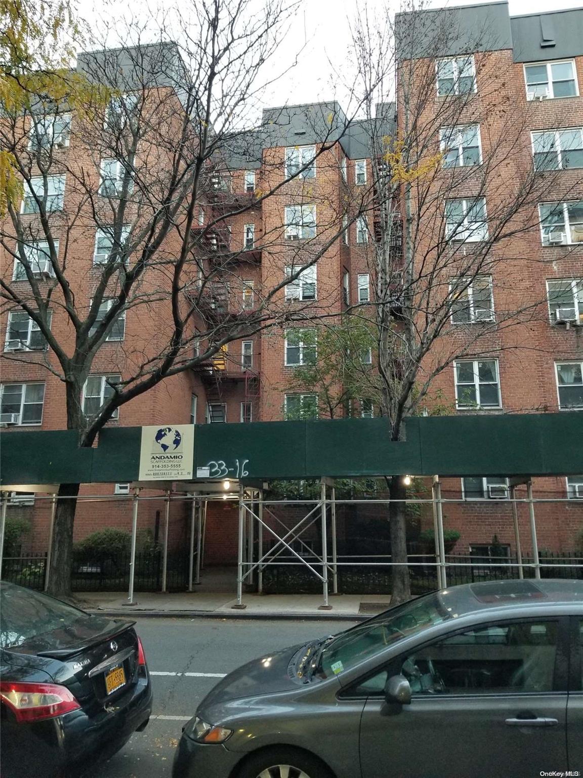 a view of a car park in front of a building