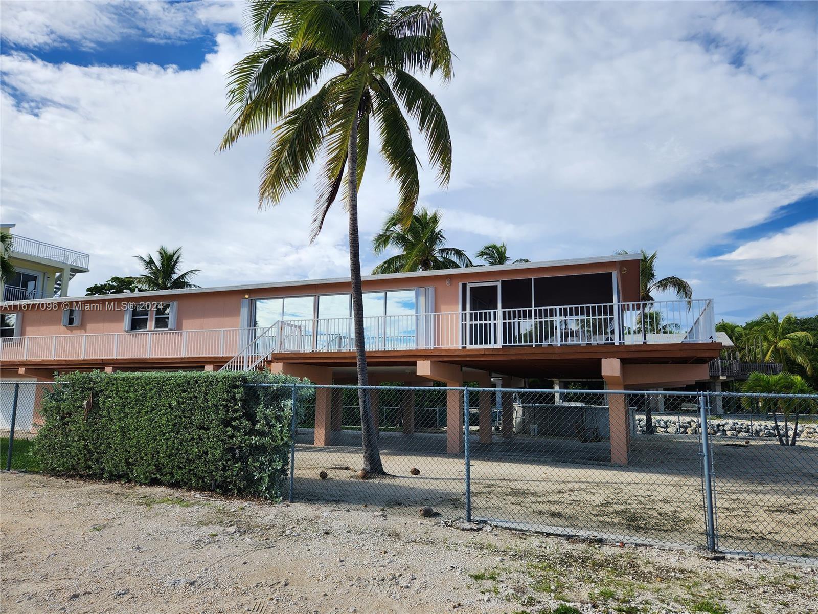 a view of house with outdoor space and entertaining space