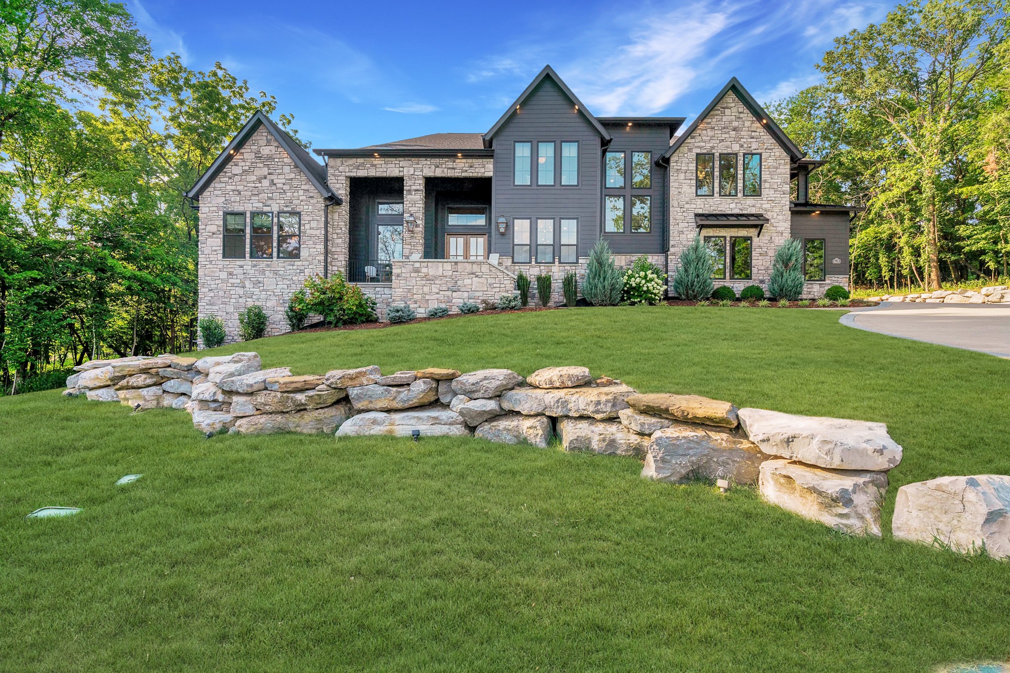 a front view of house with yard and green space