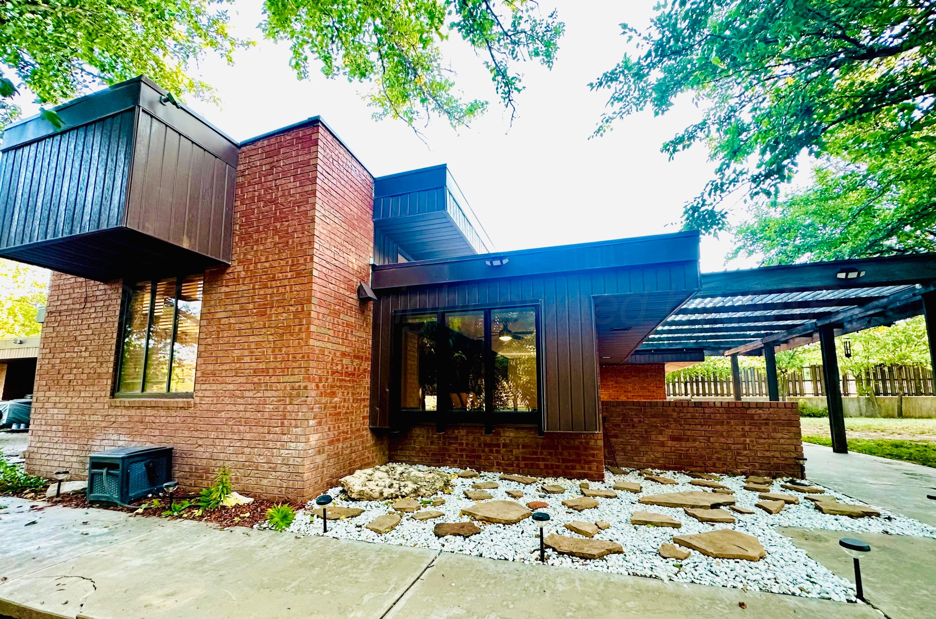 a view of a house with a patio