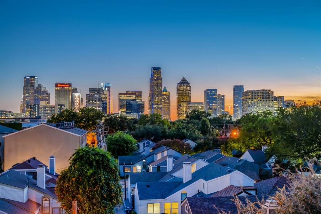 a view of a city with tall buildings